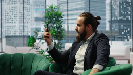 vertical video rude furious director yelling at his partners on teleconference call