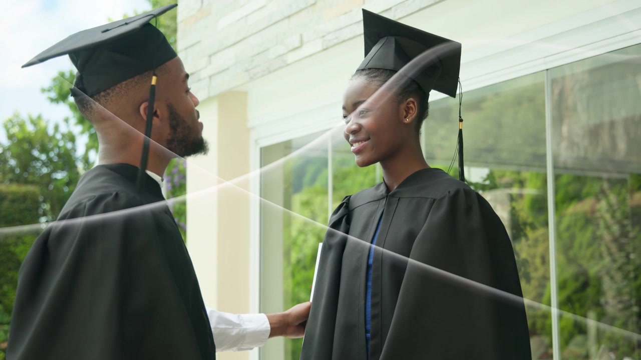 Man reaching up to woman's cap, adjusting tassel, sharing diploma, celebrating education