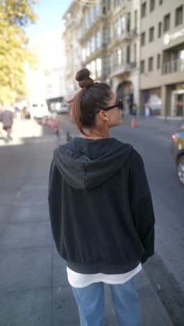 stylish woman in a cityscape