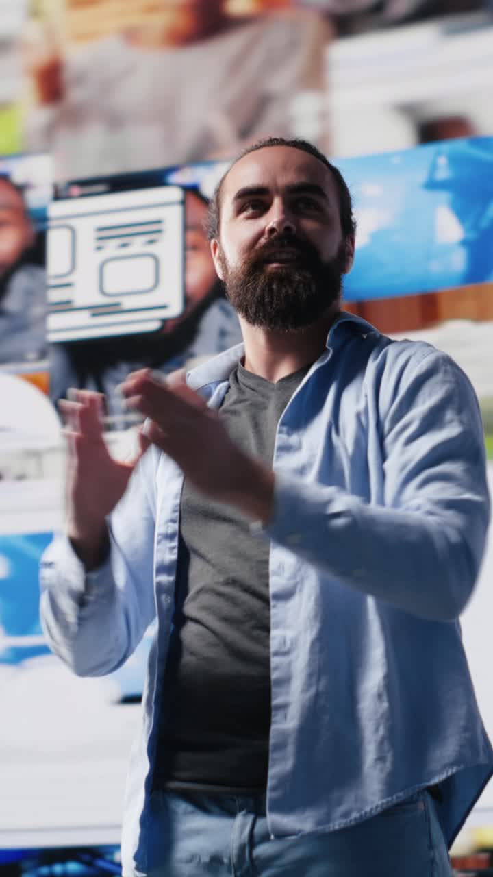 Vertical Video Ambitious confident guy admires the user interfaces on social media apps