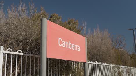 slow motion footage of the canberra station sign, capturing fine detail and texture