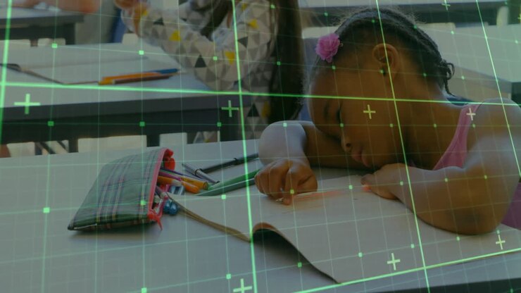 female students coloring at classroom desks, showing education chart icons floating over pencils