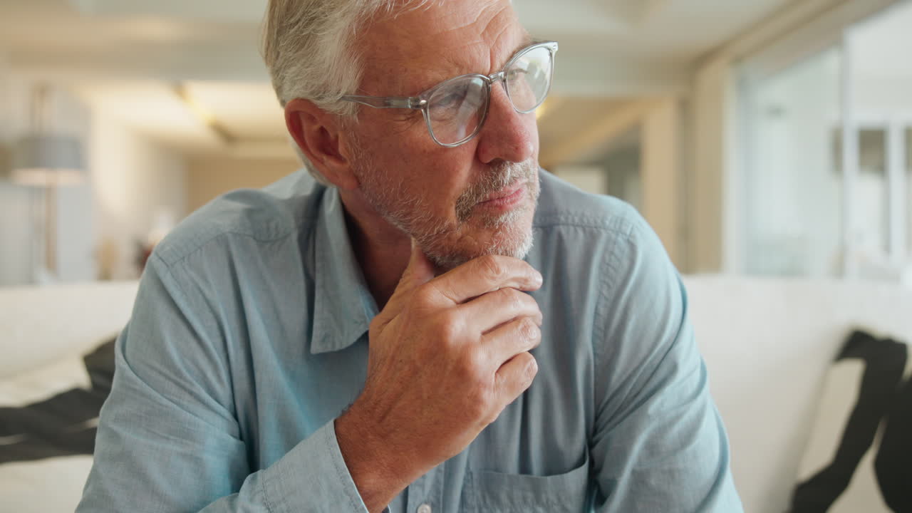 Elderly man thinking indoors