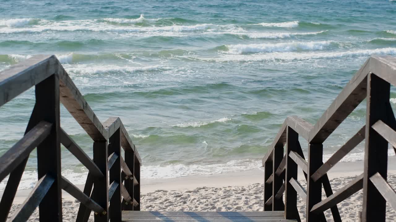 Wooden Stairs Leading to a Sandy Beach