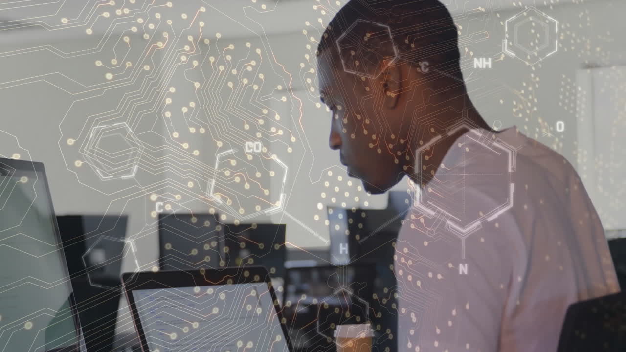 Animation of data processing over african american man using laptop