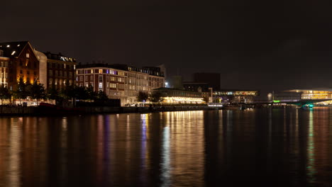 copenhagen night cityscape with water reflection timelapse