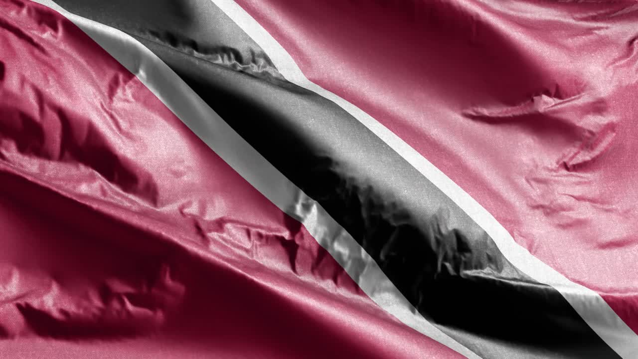 la bandera textil de trinidad y tobago ondeando en el bucle del viento. la bandera de trinidad y tobago balanceándose en la brisa. el tejido textil de tela. fondo de relleno completo. bucle de 10 segundos.