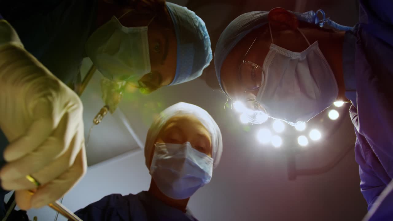 Surgeons performing operation 4k