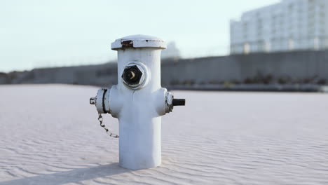 old hydrant on a seaside promenade