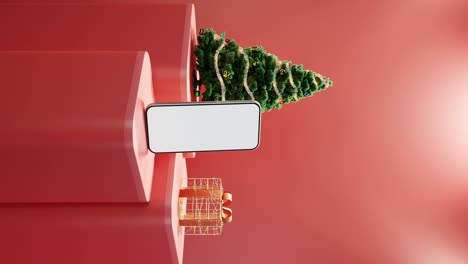 smartphone, christmas tree, and wrapped gift on red background vertical