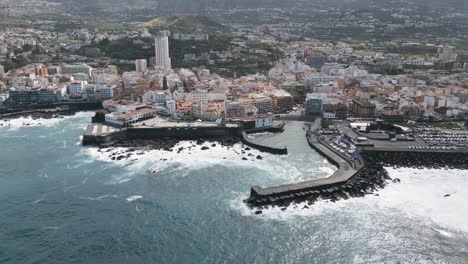 orbit shot of puerto de la cruz magnificent cityscape, tenerife, spain