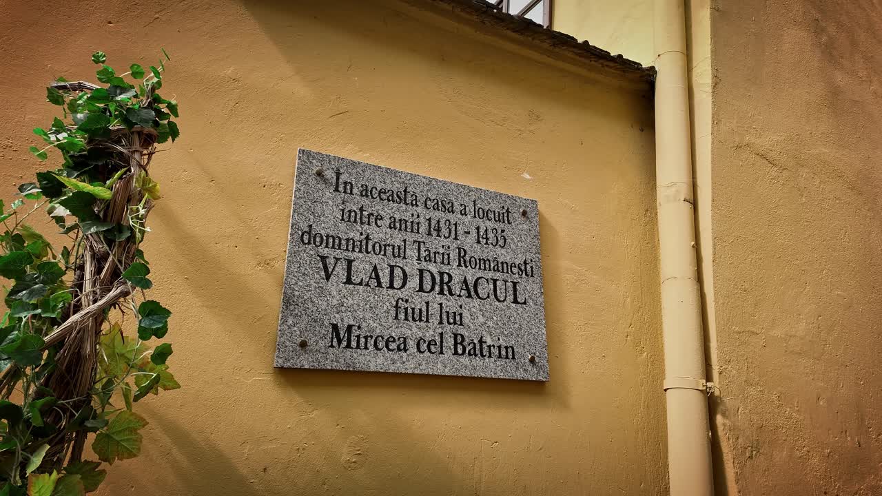 Wall plaque on Vlad Dracula’s birthplace Romanian tourist attraction