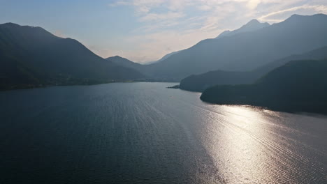 aerial tracking shot over hazy lake kawaguchi, sunny, summer day in japan