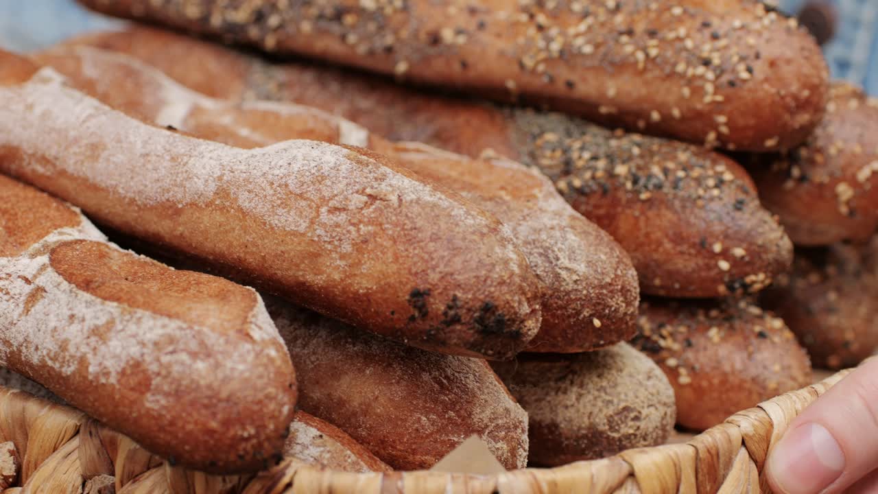 Fresh Artezan bread close-up. Artisan bread is making by skill bakers using natural and high-quality ingredients. Food with health and flavour benefits. Bakery shop and market