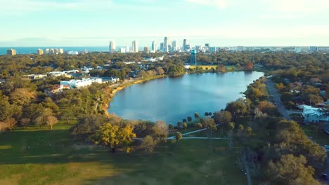 4K-Aerial-Video-of-Crescent-Lake-with-Downtown-St-Petersburg,-FL-Skyline-in-Background