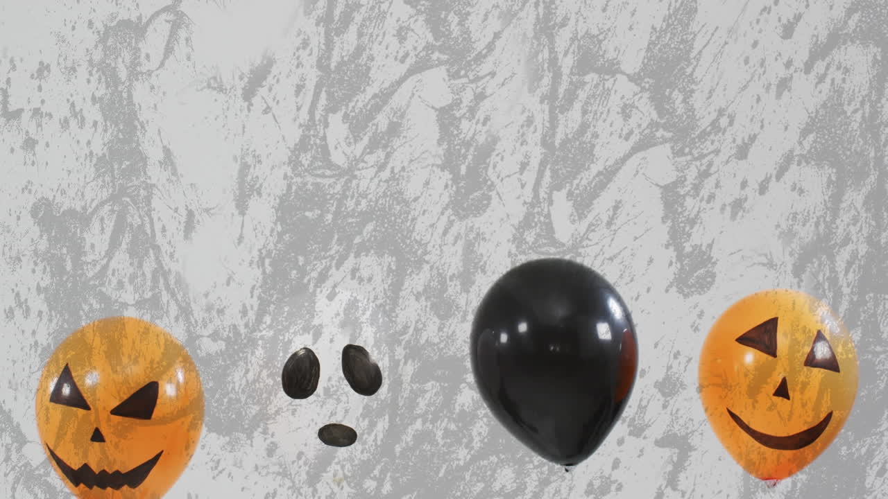 animación de globos de halloween en un fondo gris.