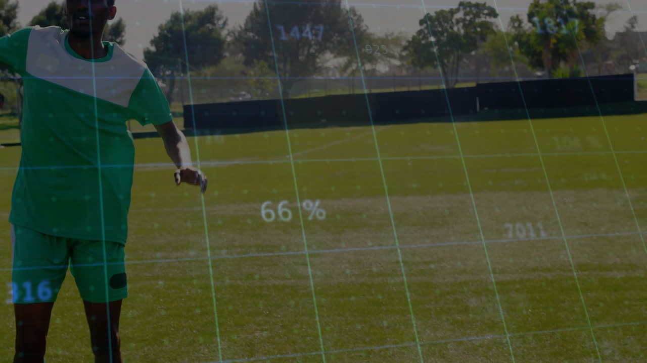 Male soccer player training on grass field, displaying sports analytics overlay with grid metrics