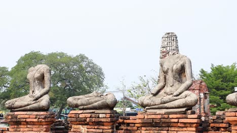 headless buddha statues in ancient ayutthaya ruins