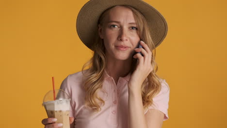 Caucasian-woman-having-phone-call-during-summer-holidays.