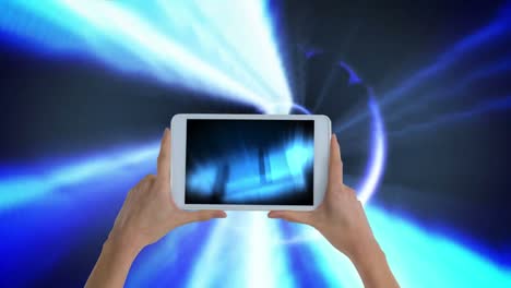 Digital-animation-of-woman-holding-digital-tablet-showing-illuminated-lights