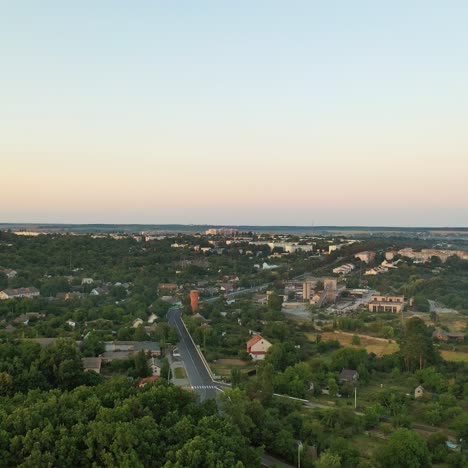 aerial footage of small town in summertime. beautiful landscape of small town or village with houses and green trees. aerial view.