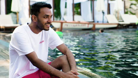 lifeguard sitting by the pool