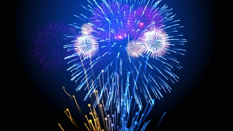 beautiful colourful fireworks shiny display at night loop background for 4th of july festival
