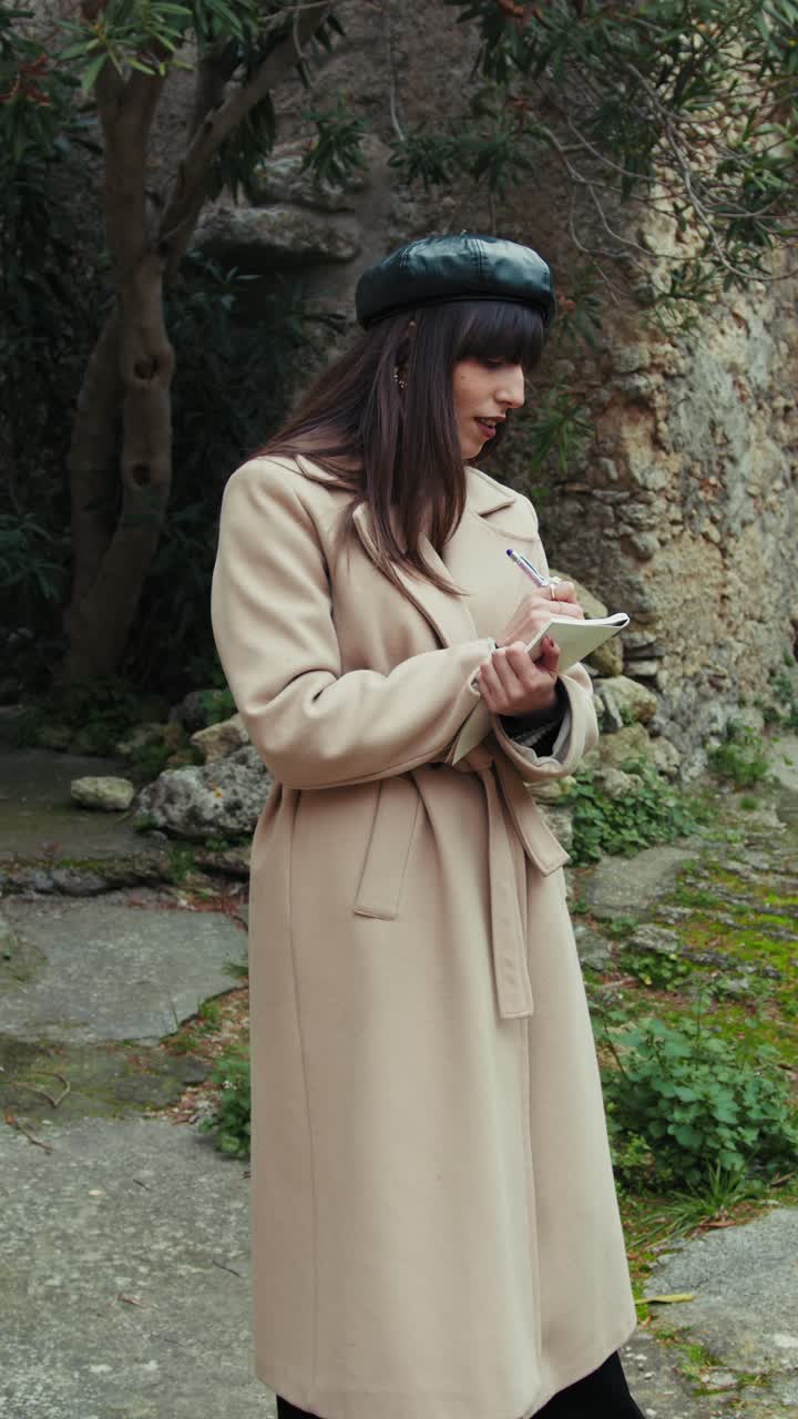 Woman Taking Notes Amazed By The Nature In The Small Italian Town