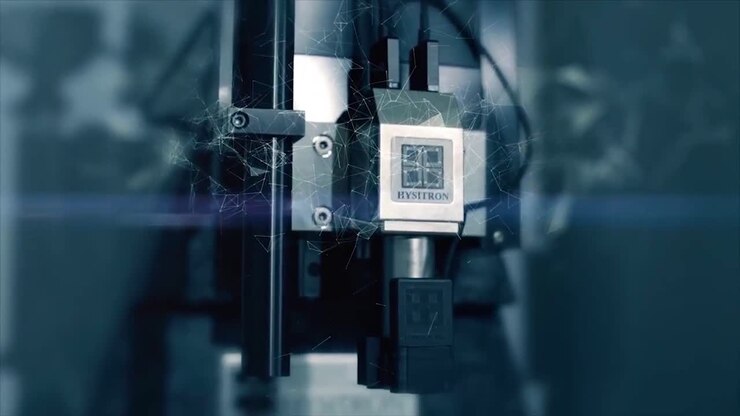 Close-up view of a complex industrial machine with a focus on the precision components and engineering design