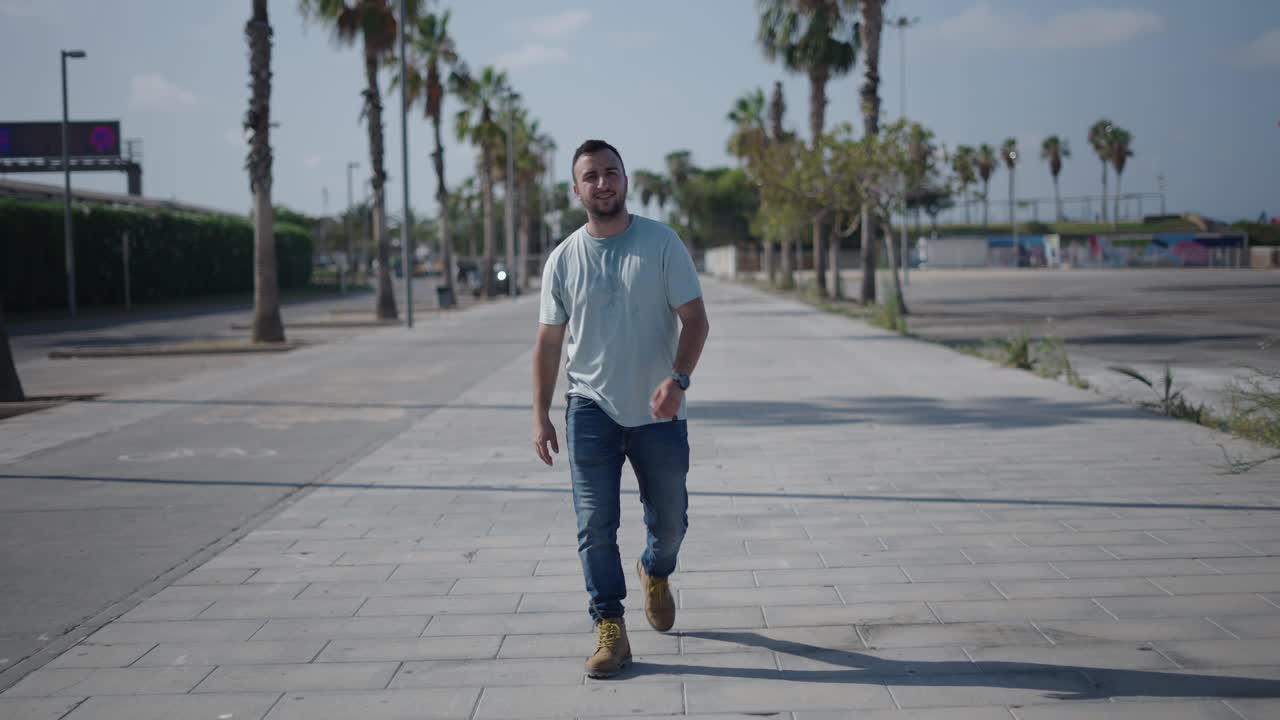 Young man walking on a city street