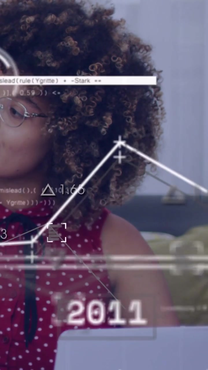 Vertical video: Female sitting on couch glancing at laptop, starting data timeline with bar charts
