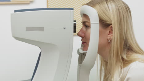 woman undergoing an eye exam