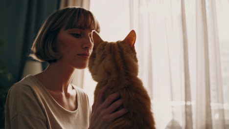 woman and cat in a living room
