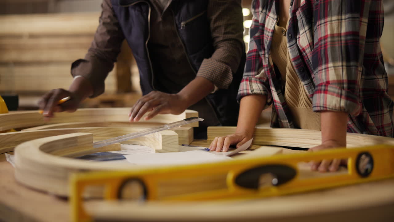 Carpenters working on a circular wood project