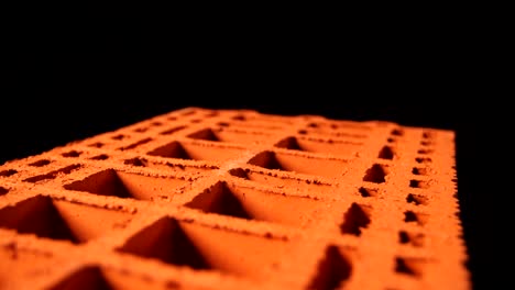 close-up of a hollow orange brick