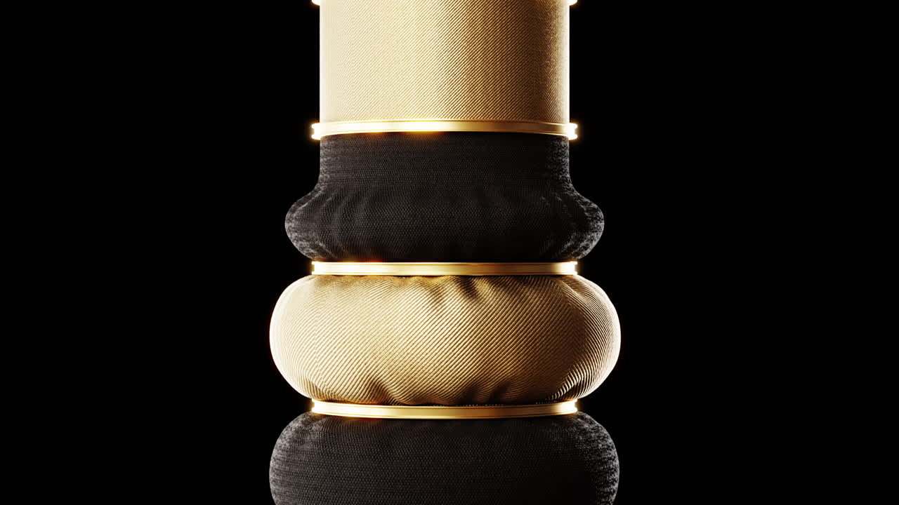 Loop animation with golden and black textile and golden rings inflating on dark background