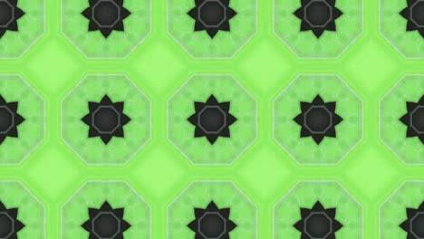 mosaic pattern with a simple design that is symmetrical. a looped motion graphic on a green background