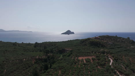 Drone-Shot-of-Zakynthos-Island-Inland-and-Ionian-Sea-Horizon-on-Summer-Day,-Greece