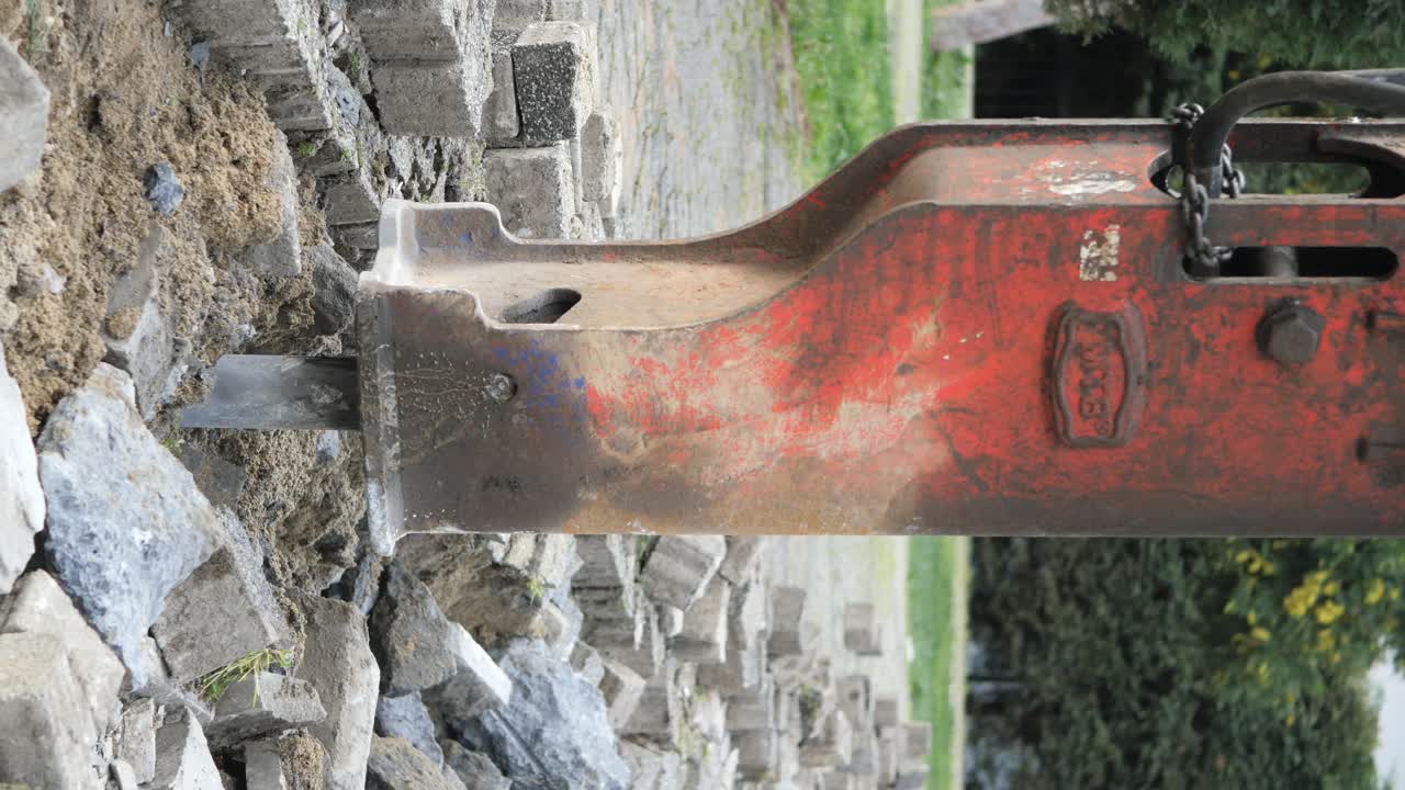 Jackhammer Removing Paving Stones