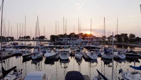 sailboats docked at the marina during beautiful summer sunset