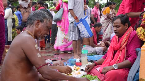 on the eve of durga puja, hindus gather at ganges for bathing and tarpan on mahalaya day.