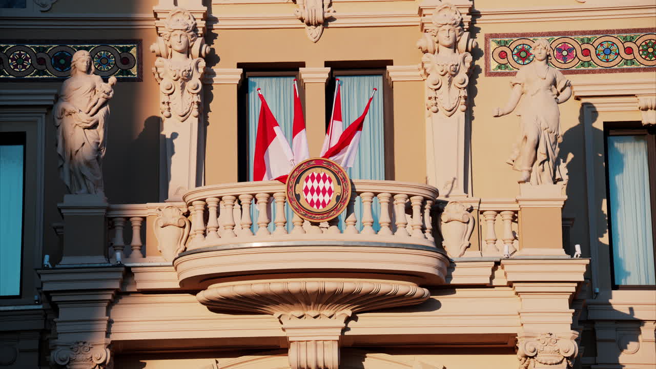 Monte Carlo, Monaco - October 24, 2024: The coat of arms of Monaco and multiple flags waving on the Monte Carlo Casino