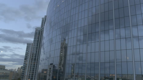 modern glass building at dusk