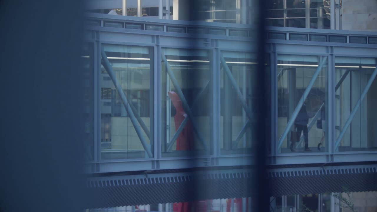 Business people walking together in the corridor at office 4k