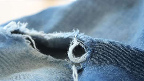 close-up of ripped denim