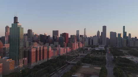 sunrise view of chicago's skyline painted in the morning light as the city comes to life