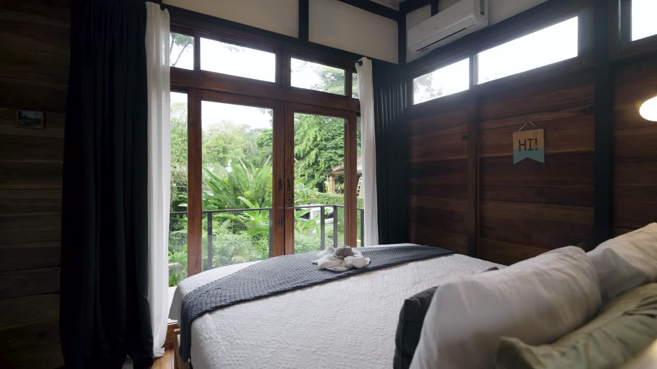 Bedroom with balcony and natural light