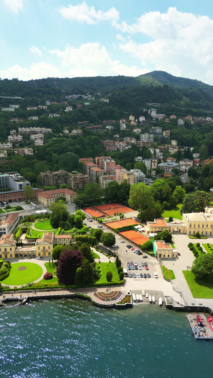 Aerial, drone view of Como, Italy on the shore of Lake Como. Vertical