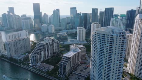 aerial establishing shot showing downtown skyscraper in miami city during sunny day, usa