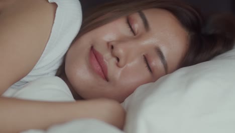 close up woman sleep on bed in bedroom.